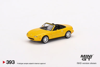 MINI GT 393 Eunos Roadster Sunburst Yellow