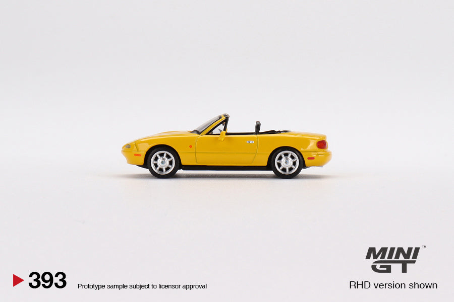 MINI GT 393 Eunos Roadster Sunburst Yellow